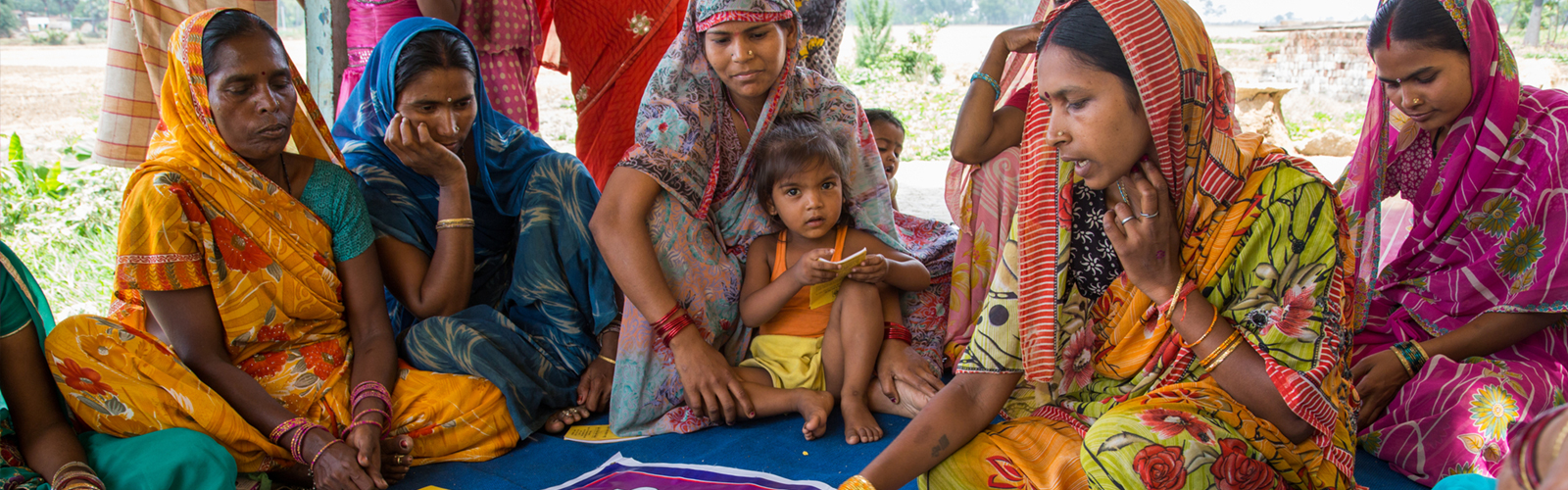 Members of a self help group learn about routine immunization from Jeevika Sakhi, Rukmini Devi 